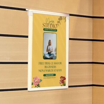 A4 frame hanging on slatwall with special clips