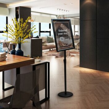 Sleek black sign stand in hotel