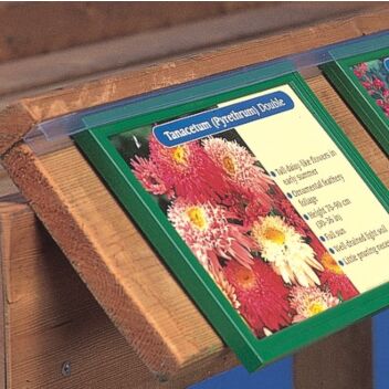 Grip strip U-channel holding a slim frame to a wooden shelf