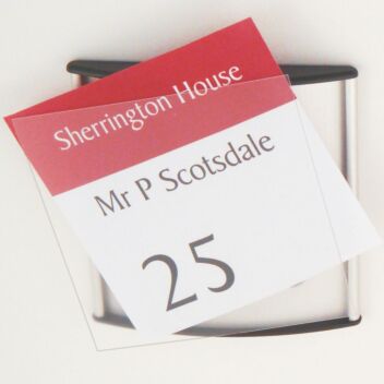 Inserting name into nameplate holder