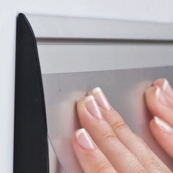 Close up of the curved aluminium sign holder