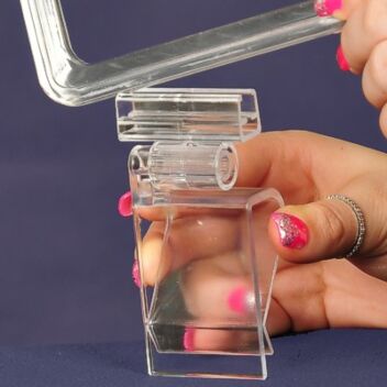 Showcard holder with multi-purpose clips
